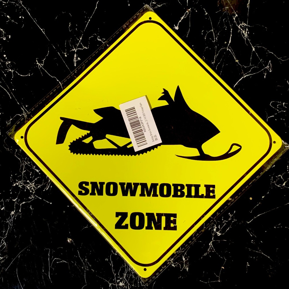 “ Snowmobile zone “ vintage sign